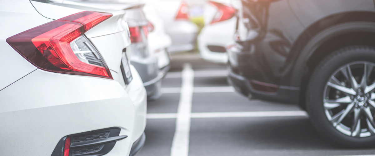 Rear view of parked cars, license plate services in El Paso at Repay Now